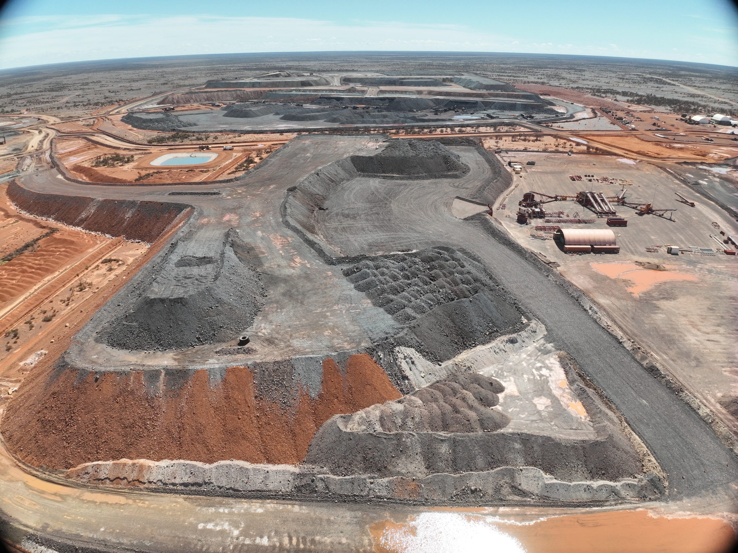 Open cut mining benches and stockpiles from the air