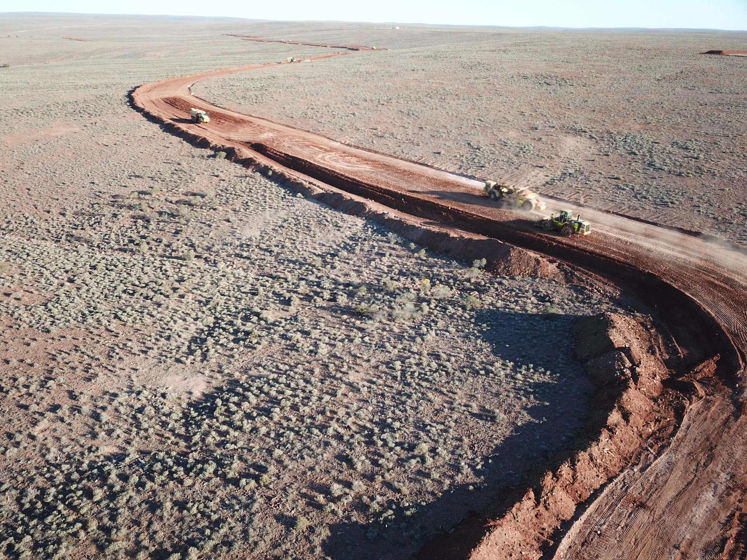Haul road being formed across open country, from the air